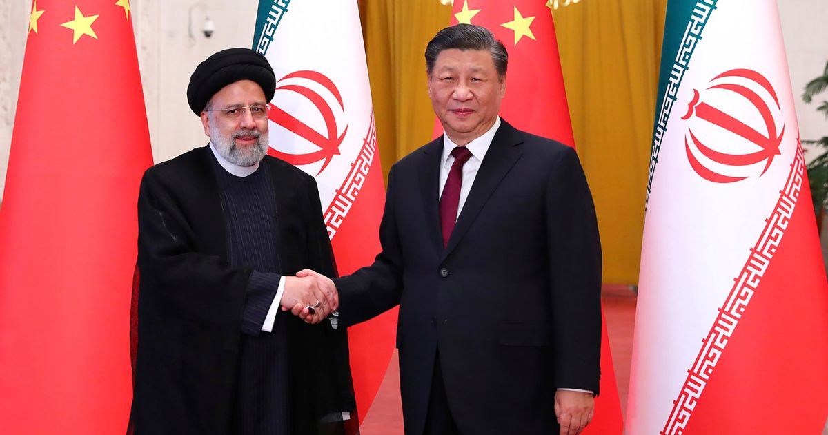 Iranian President Ebrahim Raisi, left, shakes hands with Chinese President Xi Jinping in Beijing Feb. 14. Iran and Saudi Arabia have agreed to reestablish diplomatic relations and reopen embassies in an agreement brokered by China.