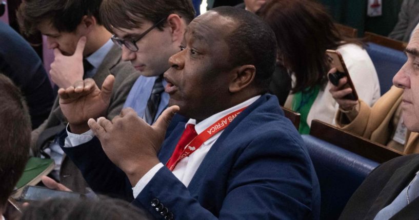 Today News Africa reporter Simon Ateba asks White House press secretary Karine Jean-Pierre a question before the daily White House briefing on March 20.