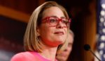 Sen. Kyrsten Sinema speaks at a news conference after the Senate passed the Respect for Marriage Act in Washington, D.C., on Nov. 29, 2022.