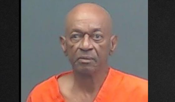 Police said Michael Clark, 79, was arrested on charges of indecency with a child and solicitation of prostitution.