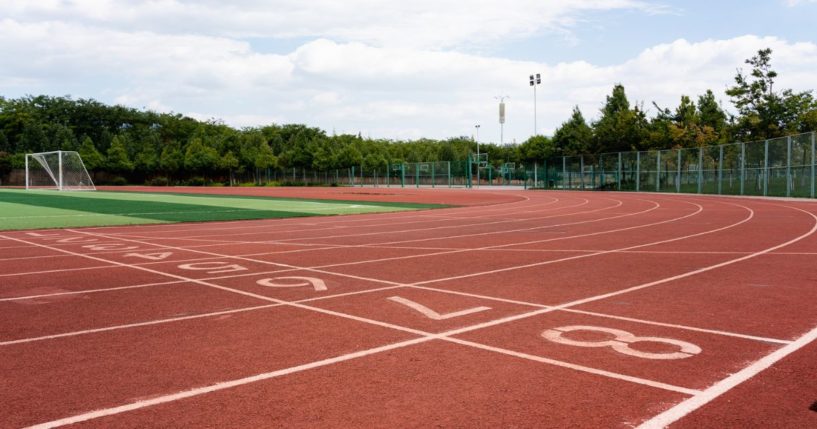 This stock photo shows a track at a high school.