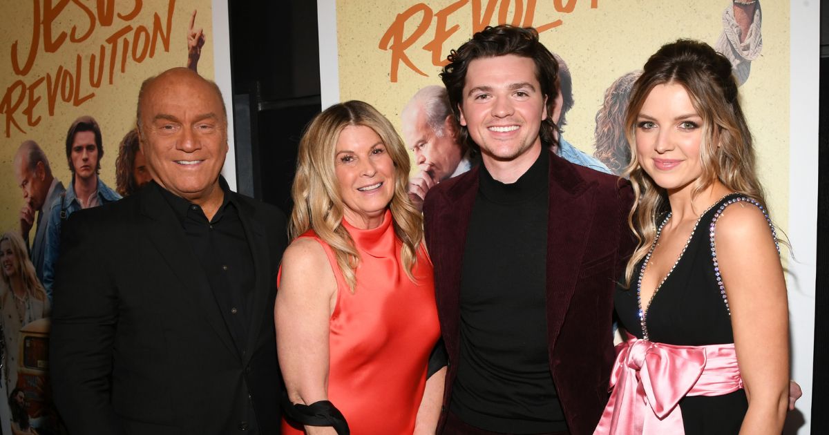 From left, Pastor Greg Laurie, along with his wife, Cathe, and actors Joel Courtney and Anna Grace Barlow, attend the "Jesus Revolution" Los Angeles premiere in Hollywood on Feb. 15.