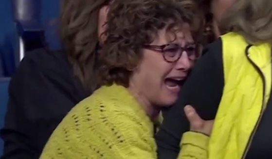 The mother of Iowa wrestler Spencer Lee was visibly distraught after Lee lost on Friday, but her tears quickly turned to frustration.