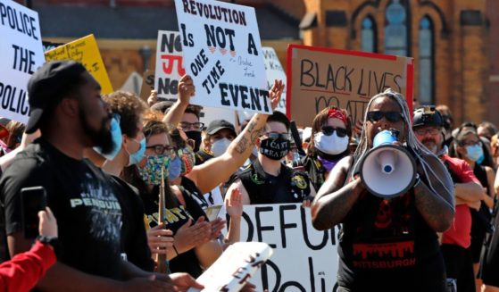 protesters participate in a Black Lives Matter rally