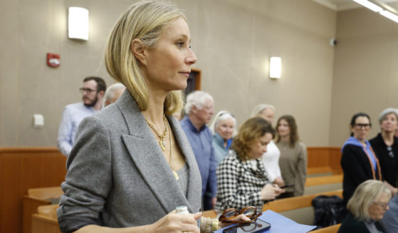 Gwyneth Paltrow enters the courtroom after a lunch break in her trial Thursday in Park City, Utah, where she is accused in a lawsuit of crashing into a skier in 2016.