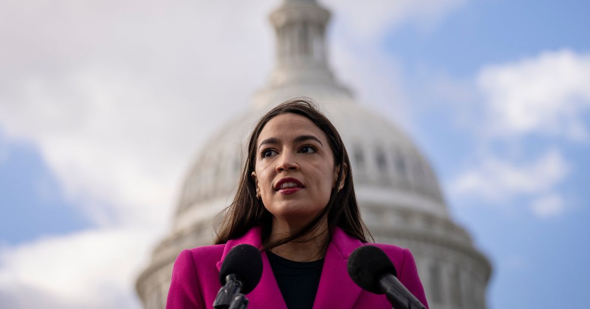 New York Rep. Alexandria Ocasio-Cortez speaks during a news conference with Democratic lawmakers outside the U.S. Capitol in Washington on Jan. 26.