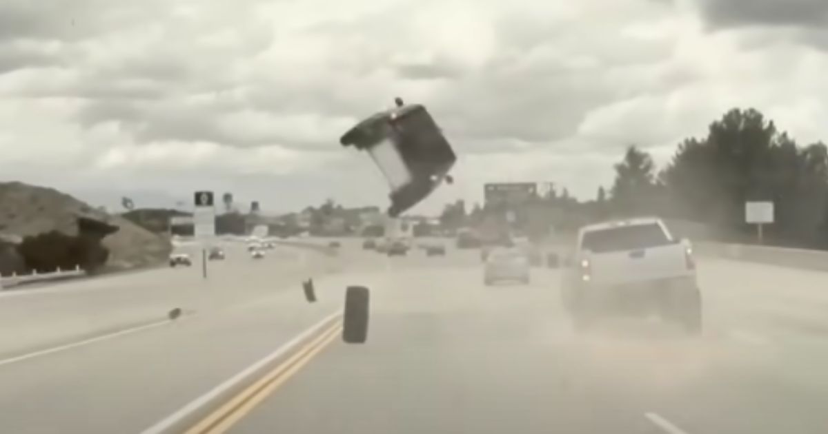 A Kia flipped over after hitting a tire in California on Thursday.