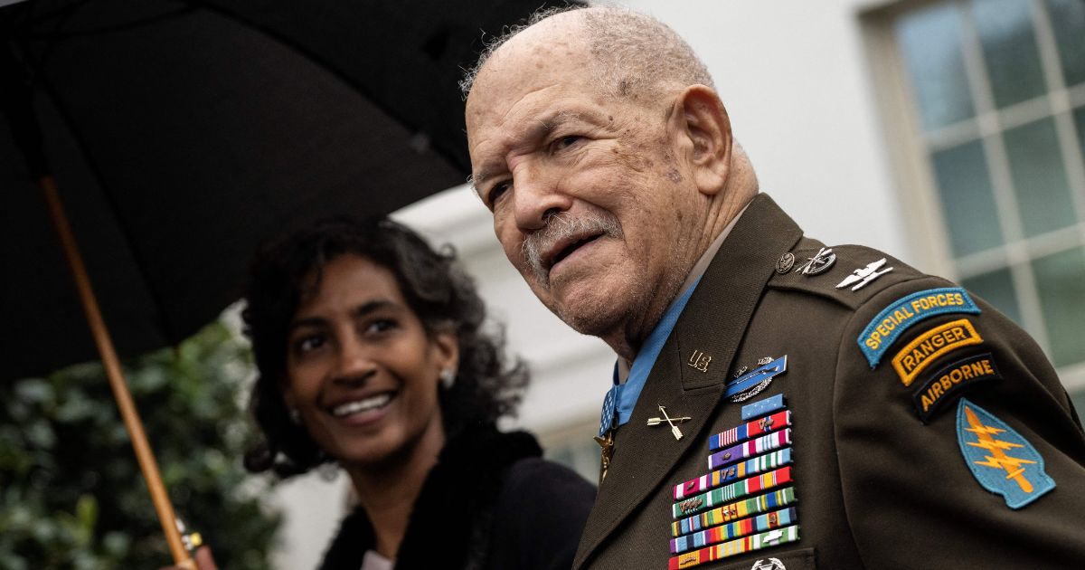 Medal of Honor recipient, retired U.S. Army Colonel Paris Davis, speaks to the press outside the West Wing at the White House in Washington, D.C., on Friday.
