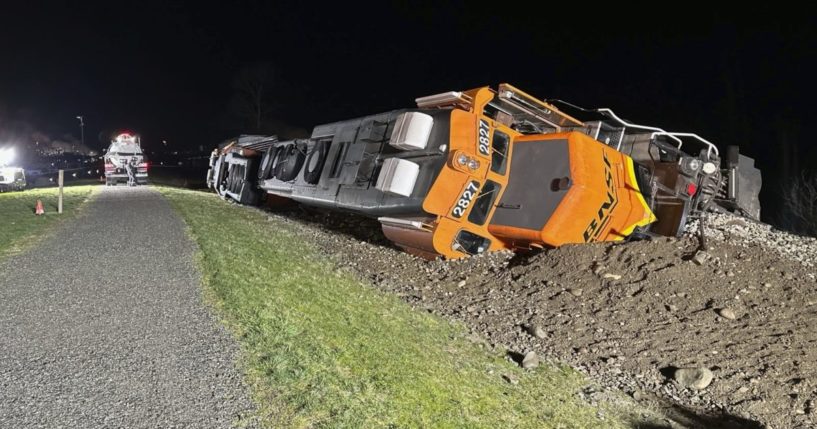 A derailed BNSF train on the Swinomish tribal reservation