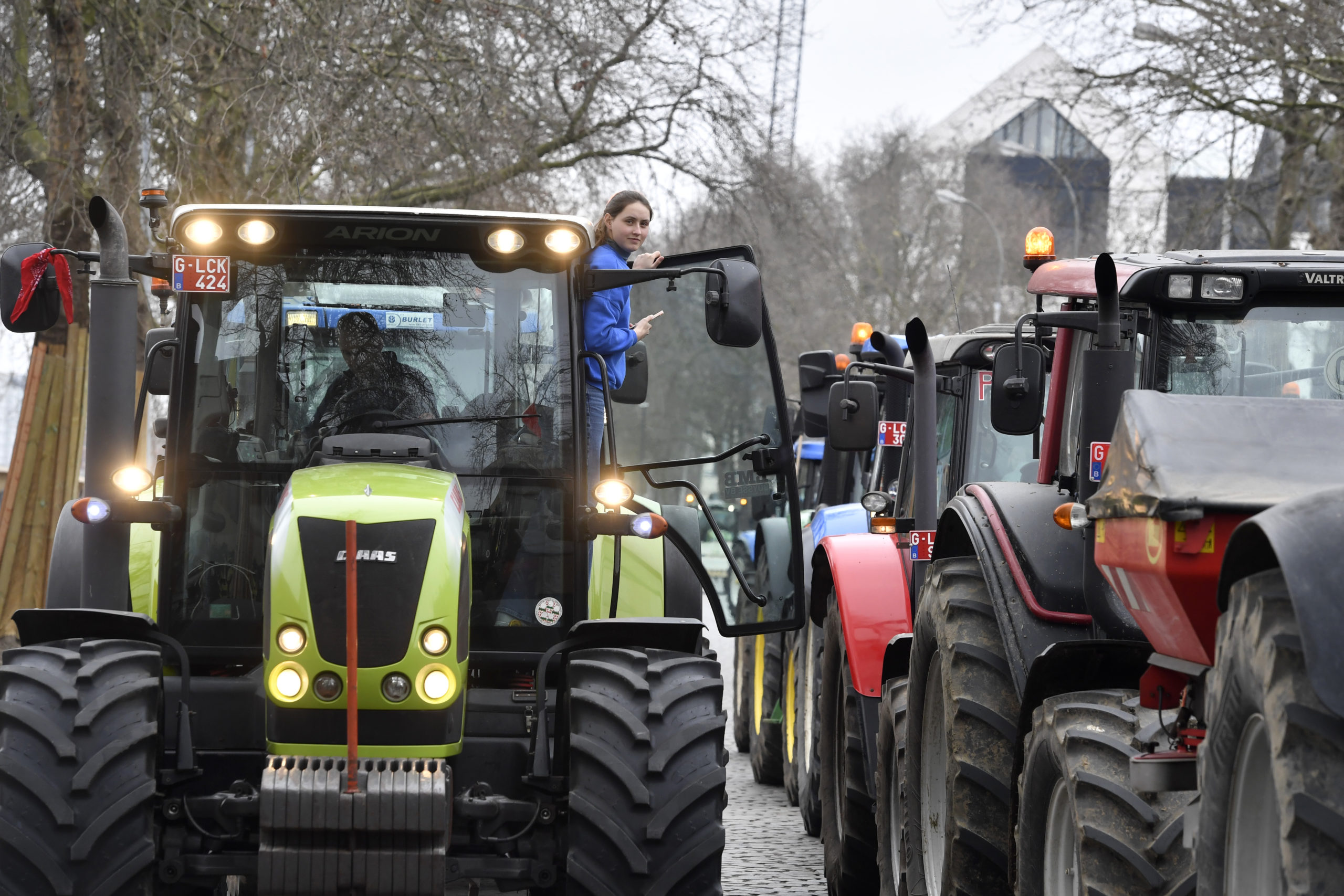 Belgian farmers block traffic with their tractors on a road in the center of Brussels during a demonstration Friday. Hundreds of tractors were driven there by angry farmers protesting a plan to cut nitrate levels.