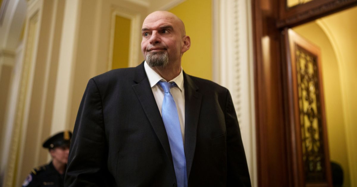 Then Sen.-elect John Fetterman (D-PA) heads to a lunch meeting with Senate Democrats at the U.S. Capitol on Nov. 15, 2022, in Washington, D.C.