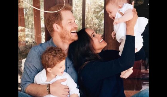 Prince Harry and Meghan are photographed with their two children, Archie and Lilibet.