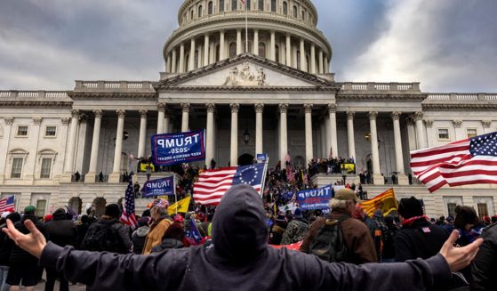 Demonstrators gather in front of the Capitol Building on January 6, 2021, protesting the election of Joe Biden.