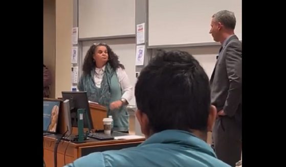 Stanford University Associated Dean Tirien Steinbach confronts U.S. Judge Stuart Kyle Duncan during an event at Stanford last weeki.