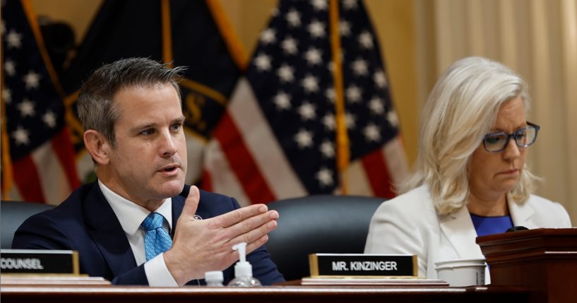 Now-former Rep. Adam Kinzinger, pictured with now-former Rep. Liz Cheney in a file photo from a July meeting of the special House committee investigating the Capitol incursion of 2021.