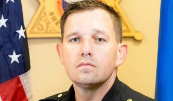 Deputy Jeremy McCain was injured when his patrol car collided with a security gate in Oklahoma.
