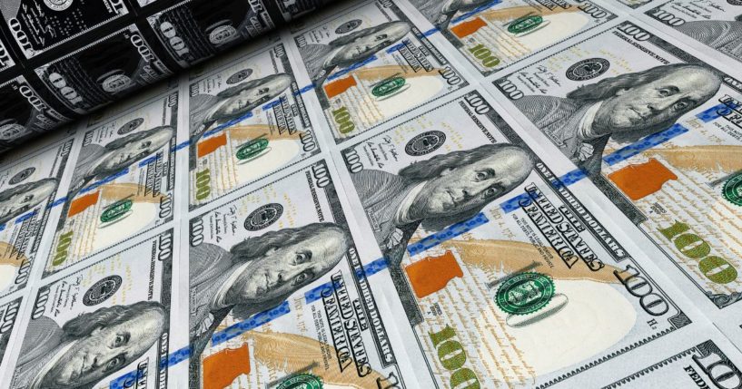 Hundred-dollar bills are printed in this stock image.