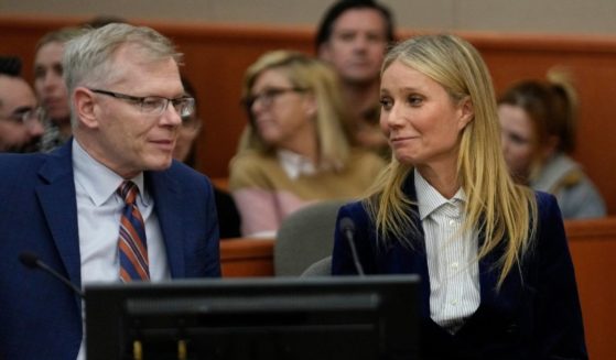 Actor Gwyneth Paltrow and attorney Steve Owens react as the verdict is read in her civil trial over a collision with another skier on March 30, 2023, in Park City, Utah.