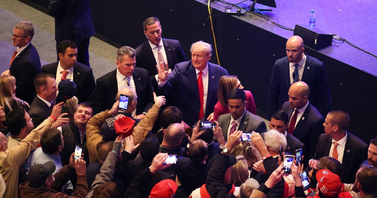 Donald Trump greets guests following an event at the Adler Theatre on March 13, 2023 in Davenport, Iowa.