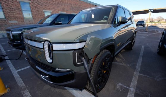 A 2023 R1S sports-utility vehicle charges at a Rivian delivery and service center in Denver.