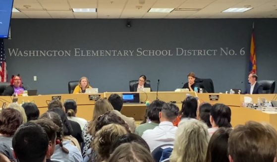 This Twitter screen shot from Drew Hernandez shows a school board meeting in Arizona.