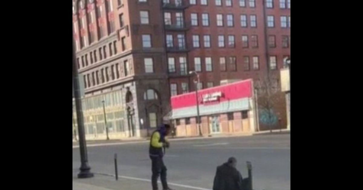 A suspect is seen loading a gun in St. Louis.
