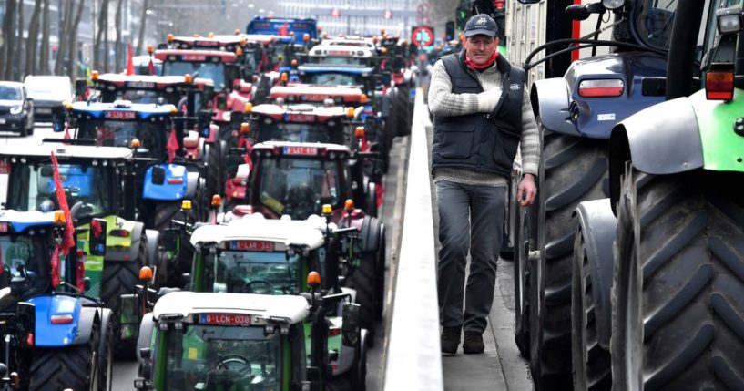 Farmers with their tractors block traffic
