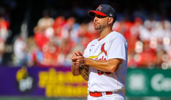 Adam Wainwright #50 of the St. Louis Cardinals pauses on the mound during the fifth inning against the Pittsburgh Pirates at Busch Stadium on Oct. 2, 2022, in St. Louis.