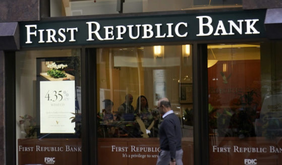 A pedestrian walks past a First Republic Bank in San Francisco.