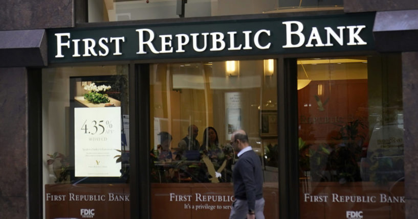 A pedestrian walks past a First Republic Bank in San Francisco.