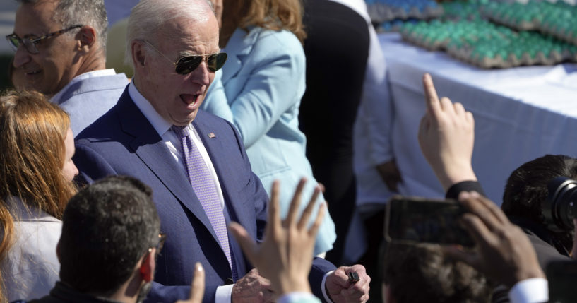 Joe Biden greets guests at the 2023 White House Easter Egg Roll