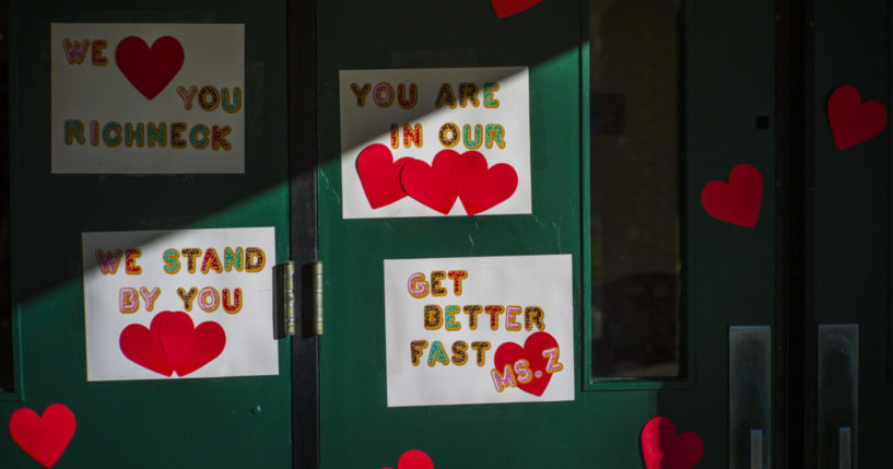 messages of support for teacher Abby Zwerner on a school door