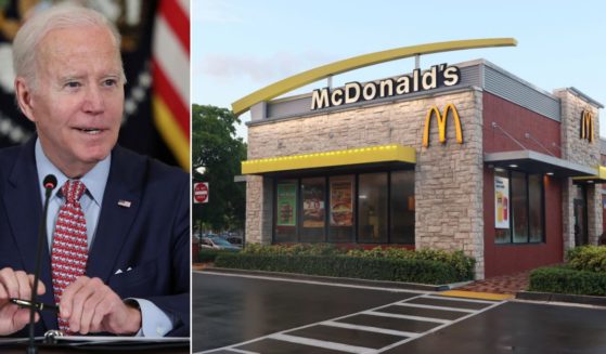 At left, President Joe Biden meets with advisers at the White House in Washington on Tuesday. At right, a McDonald's restaurant in Miami is seen May 29, 2022.