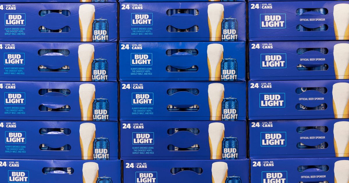 Twenty-four packs of Bud Light beer are displayed at a store in Indianapolis in August 2022.