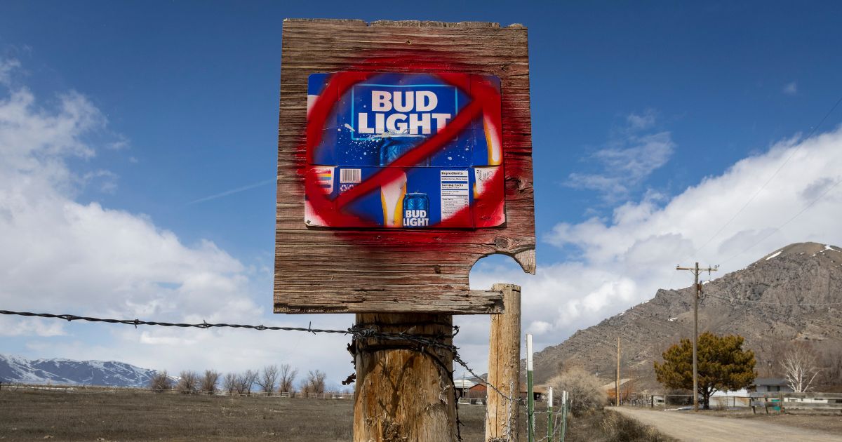 A sign disparaging Bud Light beer is seen along a country road in Arco, Idaho, on Friday.
