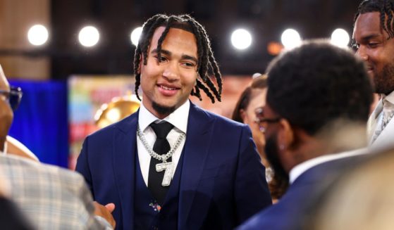 C.J. Stroud smiles backstage after being selected by the Houston Texans in the first round of the NFL draft at Union Station in Kansas City, Missouri, on Thursday night.