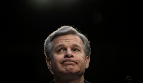 FBI Director Christopher Wray testifies during a Senate Intelligence Committee hearing on Capitol Hill on March 8 in Washington, D.C.