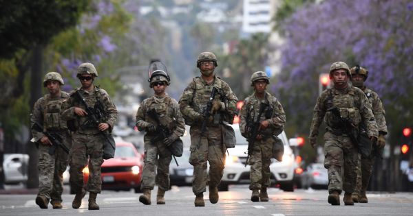 Members of the California National Guard patrol on Hollywood Blvd in Hollywood, California, on June 1, 2020.