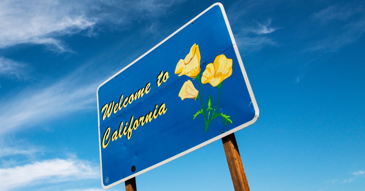 A sign on the California-Oregon border welcomes people to California.
