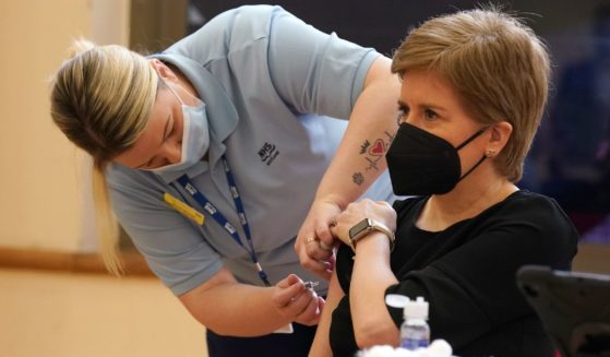 Then-First Minister of Scotland Nicola Sturgeon receives a COVID vaccine booster in Glasgow, Scotland, on Nov. 14, 2022.