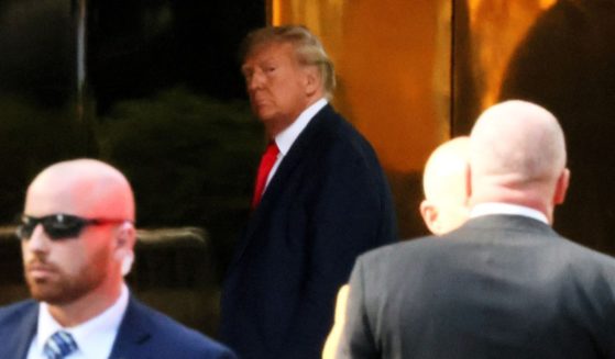 Former President Donald Trump arrives at Trump Tower in New York City on Monday.