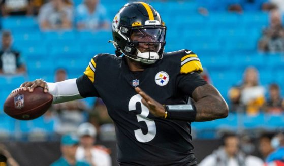 Pittsburgh Steelers then-quarterback Dwayne Haskins goes to make a pass against the Carolina Panthers in Charlotte, North Carolina, on Aug. 27, 2021.