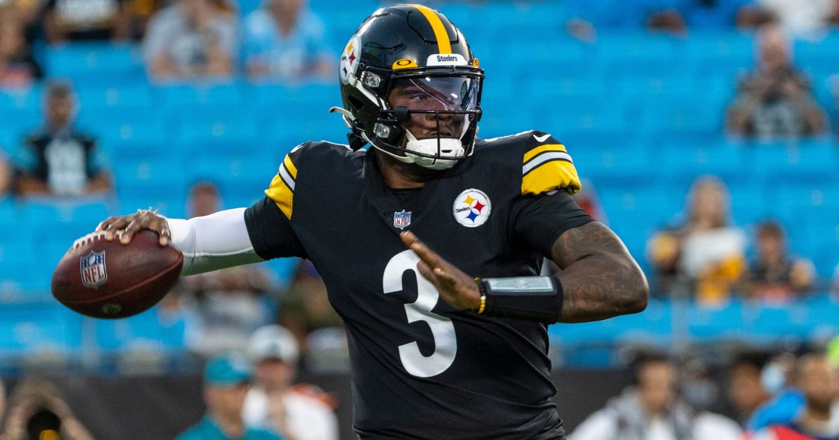 Pittsburgh Steelers then-quarterback Dwayne Haskins goes to make a pass against the Carolina Panthers in Charlotte, North Carolina, on Aug. 27, 2021.