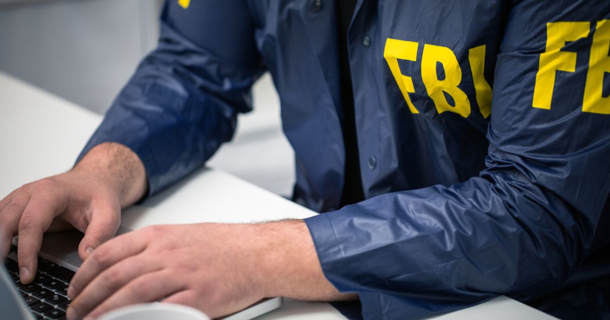 An FBI agent uses a computer in this stock image.
