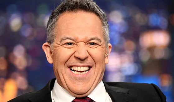 Greg Gutfeld laughs while hosting "Gutfeld!" at the Fox News Channel Studios in New York on Feb. 14.