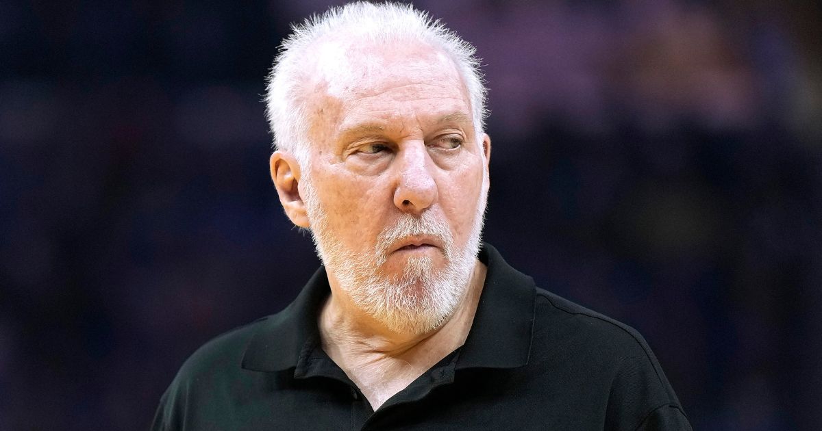 San Antonio Spurs head coach Gregg Popovich watches from the bench during the game against the Golden State Warriors in San Francisco, California, on March 31.