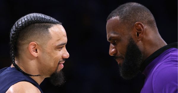 LeBron James, right, of the Los Angeles Lakers talks with Dillon Brooks, left, of the Memphis Grizzlies before Game Three of the Western Conference First Round Playoffs in Los Angeles, California, on Saturday.
