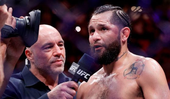 Jorge Masvidal, right, speaks with UFC commentator Joe Rogan, left, announcing his retirement after his loss to Gilbert Burns at UFC 287 in Miami, Florida, on Saturday.