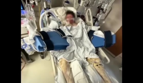 This YouTube screen shot shows Mason Dark, 16, who was hurt in a 'flame-thrower' incident, recovering at a hospital.