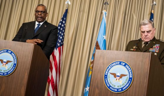 U.S. Secretary of Defense Lloyd Austin and Chairman of the U.S. Joint Chiefs of Staff Gen. Mark Milley speak to the media at Ramstein Air Base on Friday in Ramstein-Miesenbach, Germany.